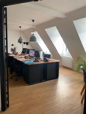 Private office On the 7th and last floor of a Haussmannian building